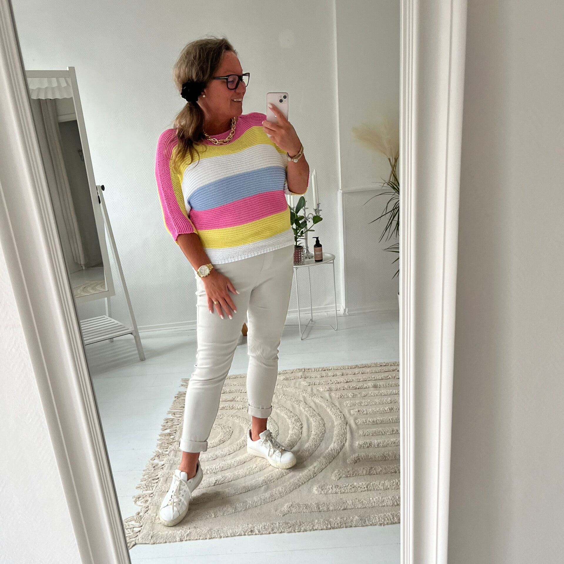 Flerfärgad randig stickad tröja