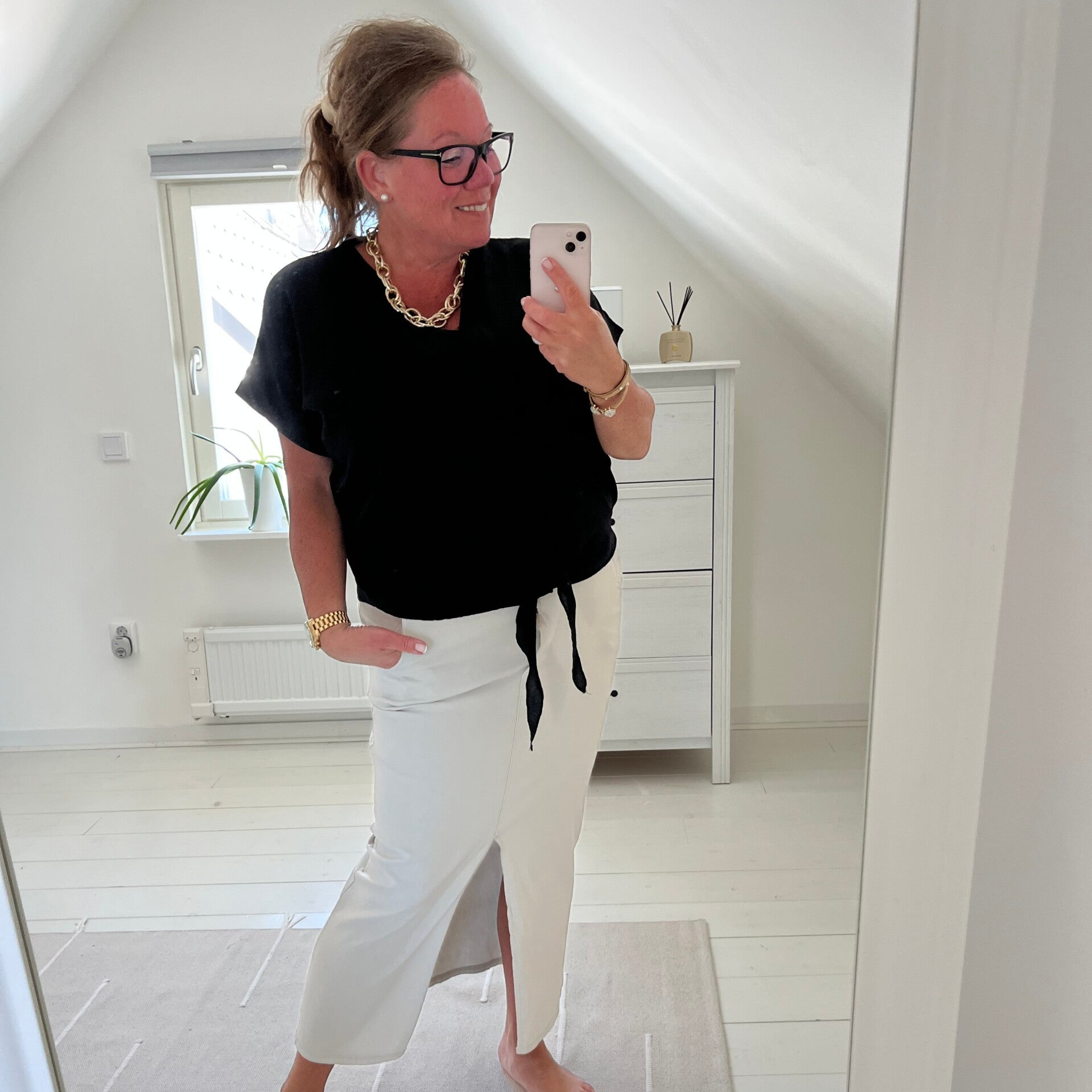 Topp knyte svart