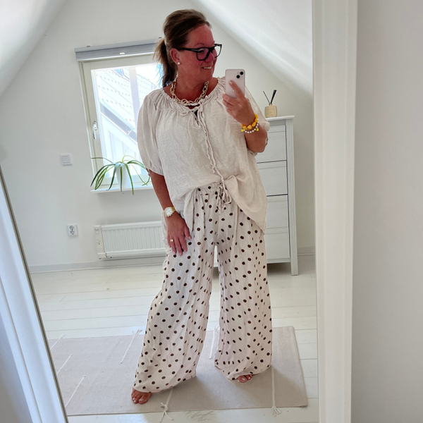 Blus oversize modell beige