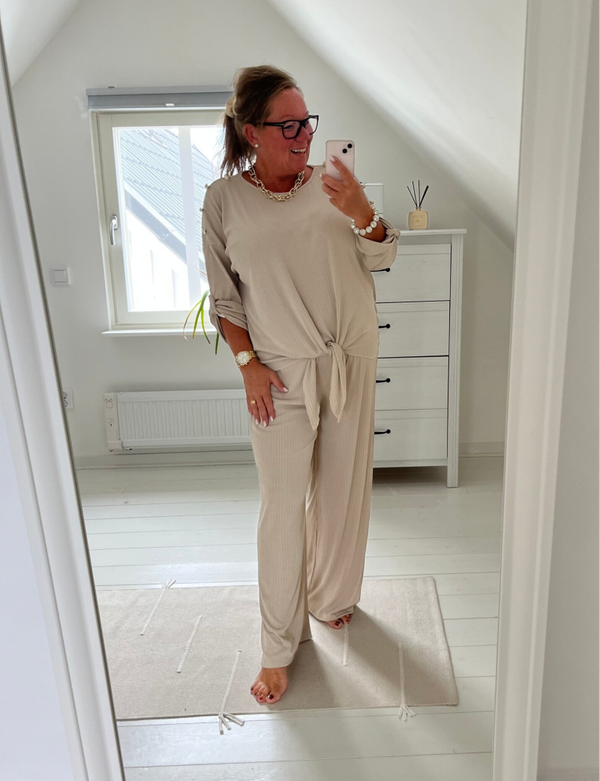 Beige vid byxa