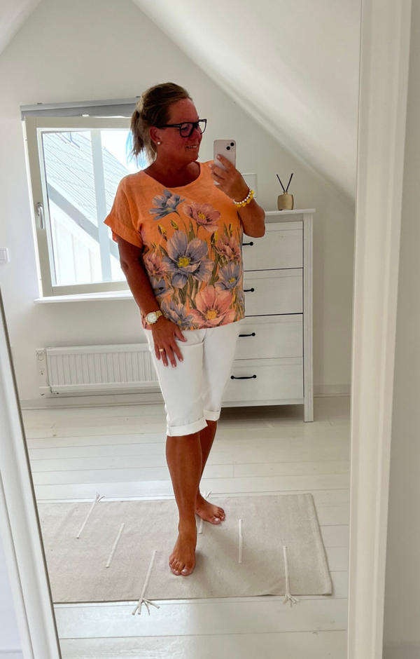 Blommig topp orange