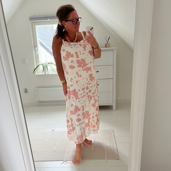 Klänning komönster rosa