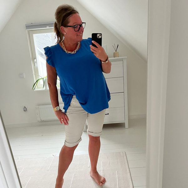 Magiska shorts med knappar vit