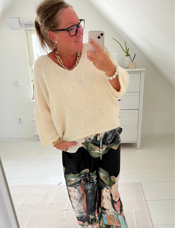 Glesstickad tröja beige