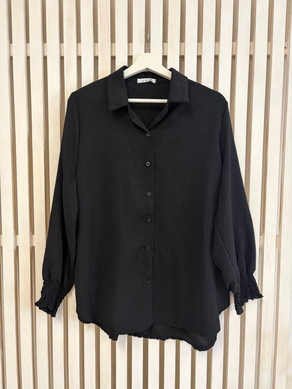 Blus svart