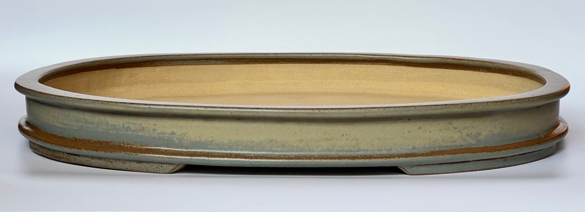 30. Ovale gris/marron 48x36x6