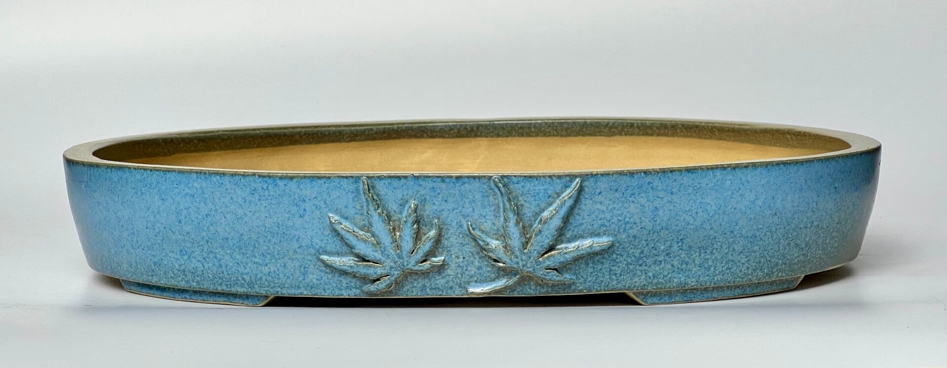 84.  Ovale bleu 31x24,5x5