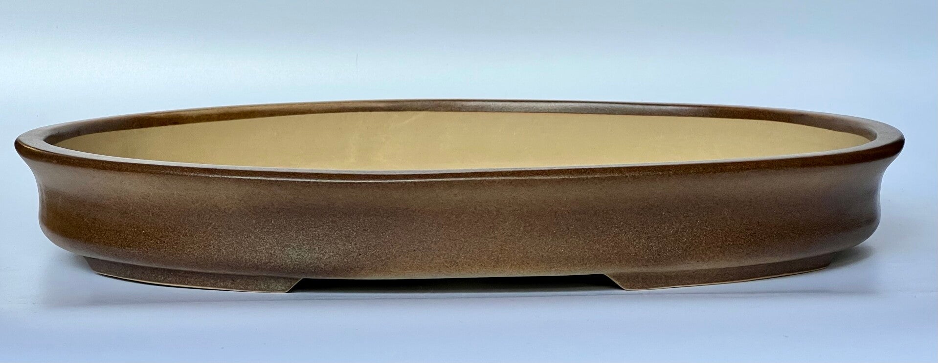 86. Ovale beige foncé 44x34x6