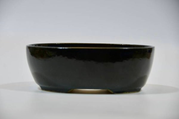 134. Ovale bleu/noir 16,5x13x5,5