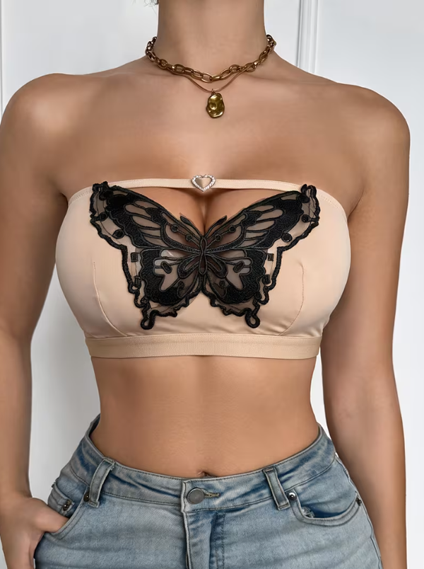 Bustier bandeau beige avec papillon en dentelle noire et cœur argenté