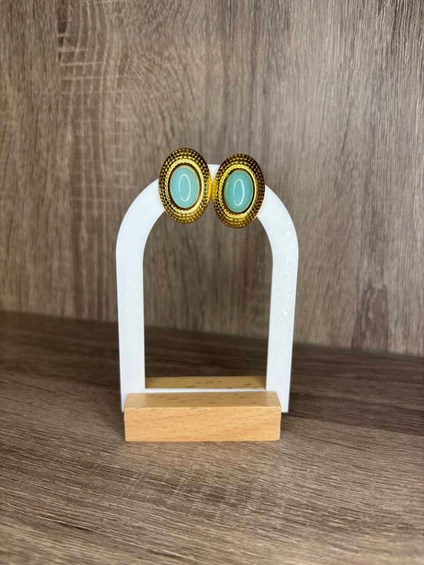 Boucles d'oreilles dorées clips ovales avec pierre nature bleue