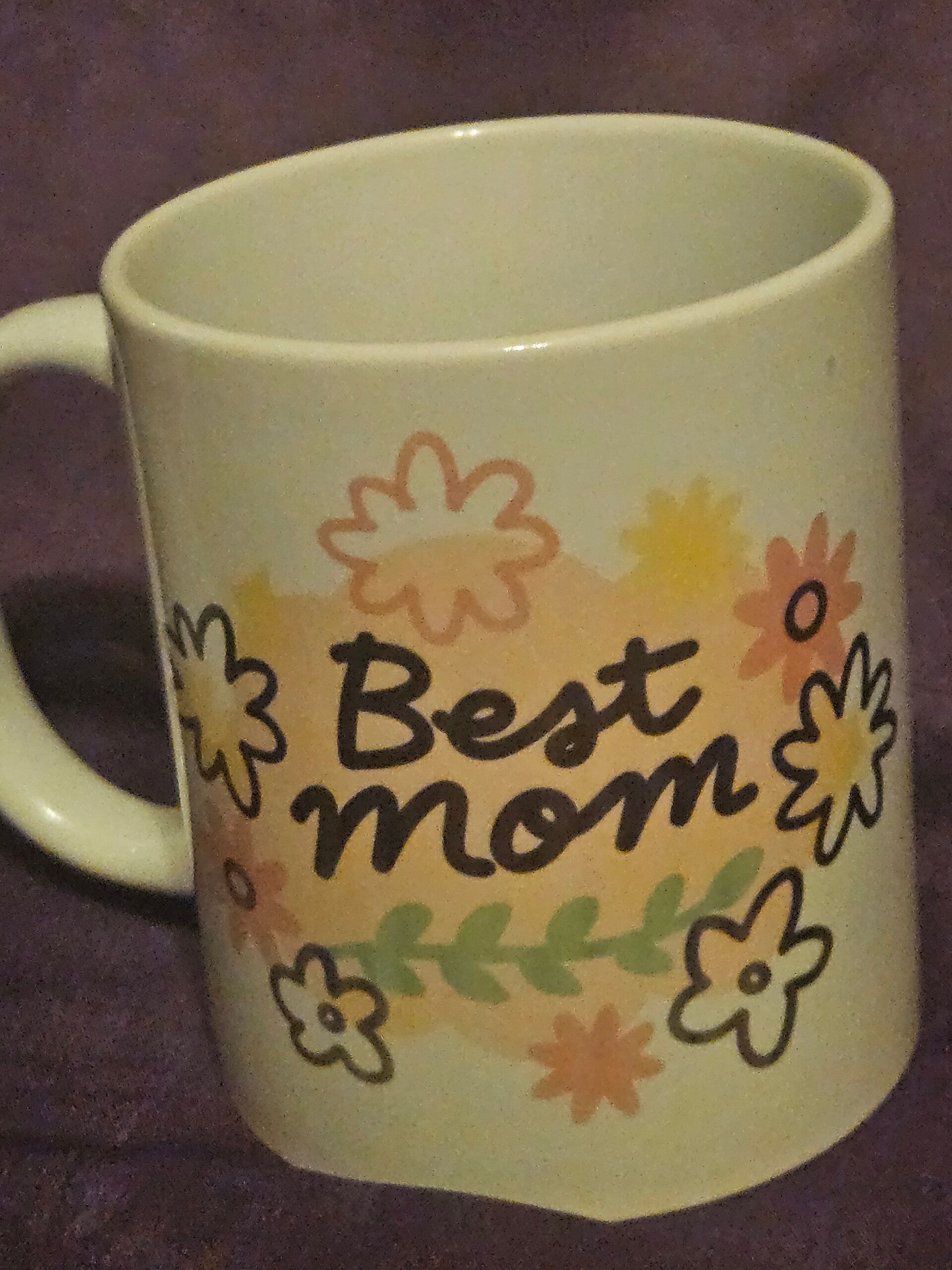 Celebrate the best woman in your life with this charming "Best Mom" 11oz ceramic mug