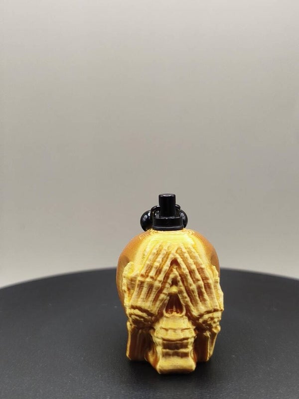 skull gold see no evil