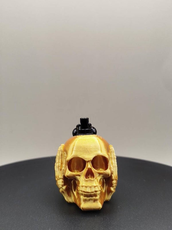 skull gold hear no evil