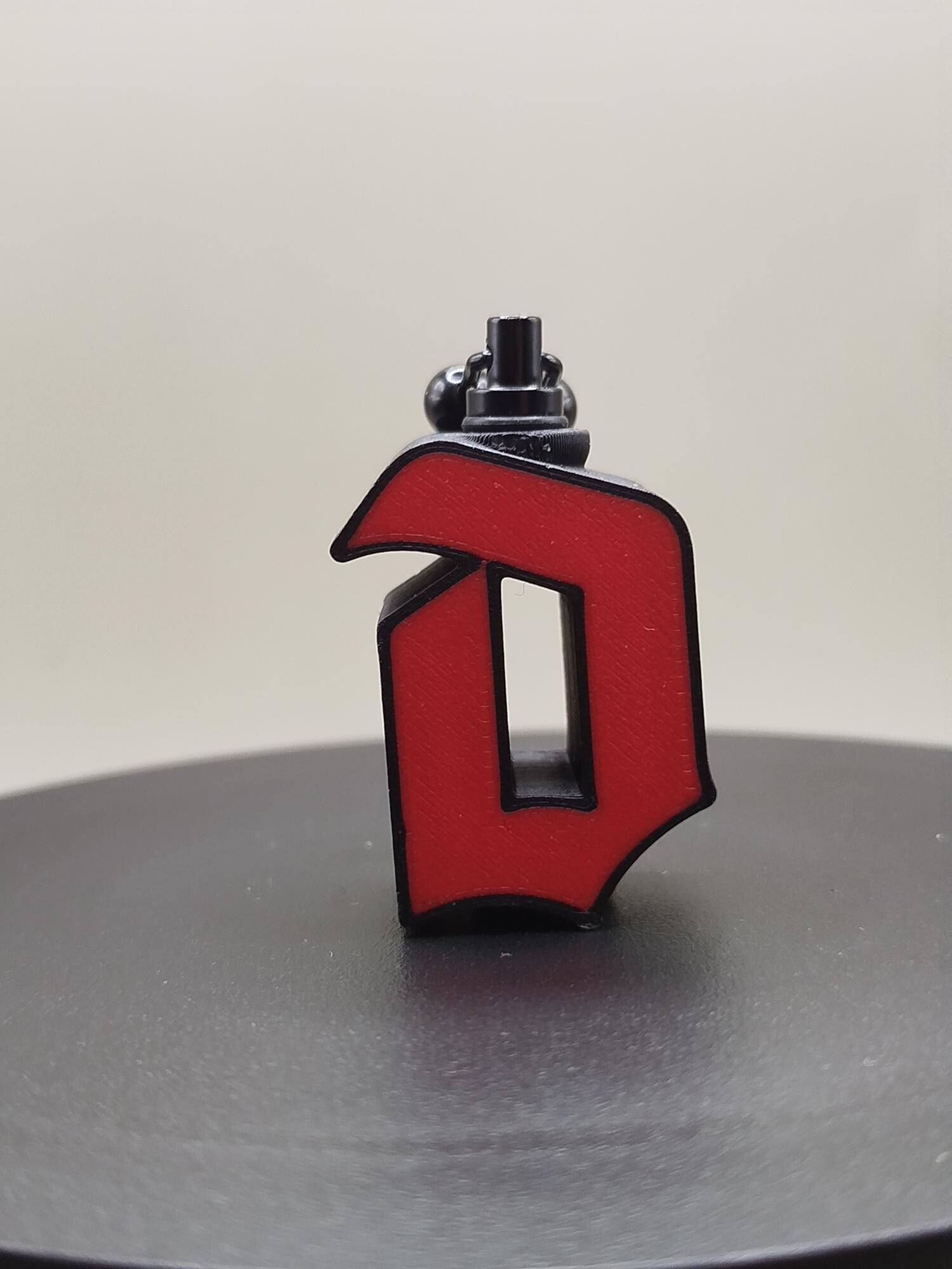 Duvel letter rood