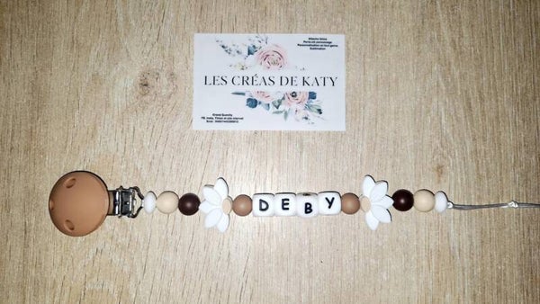 Attache tétine demi fleurs