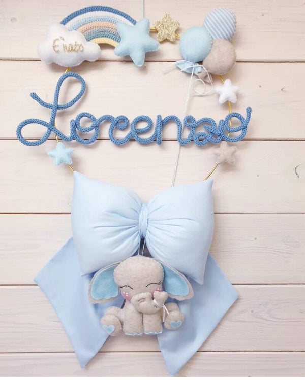 Fiocco con animaletto che pende dal fiocco