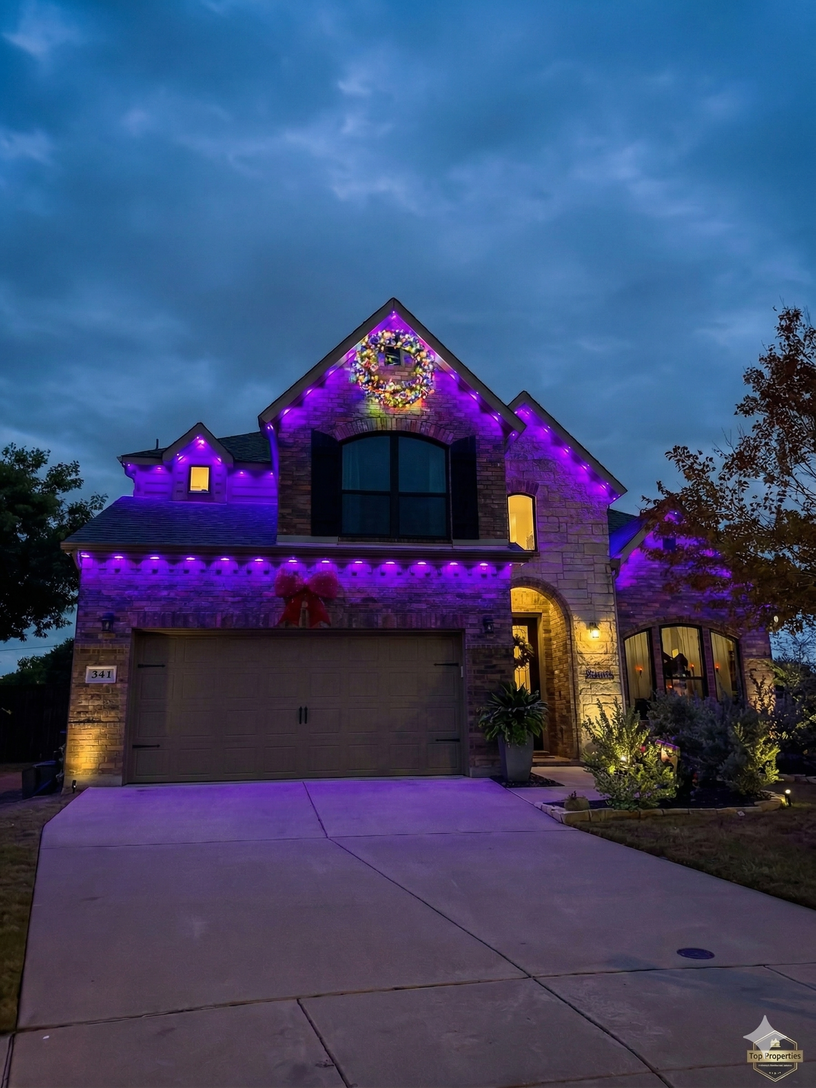 Programmable permanent LED lighting displaying multiple colors on a DFW home exterior
