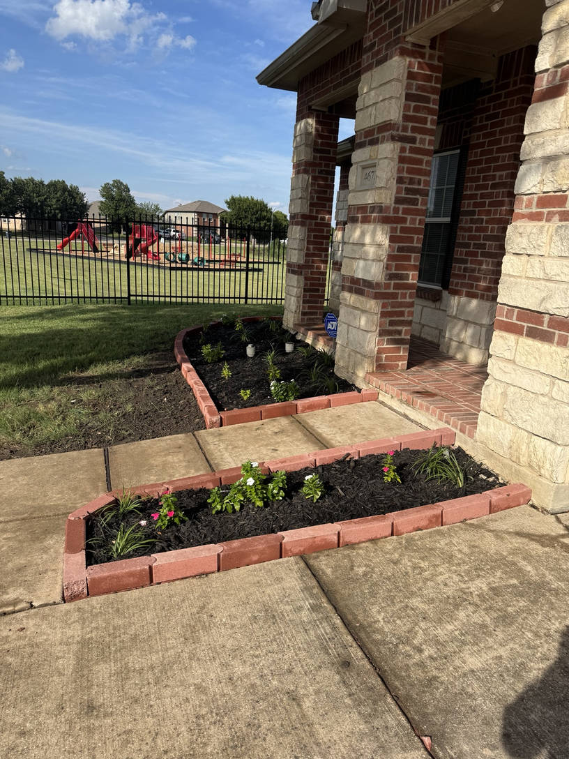 Fresh mulch installation with clean bed edging for polished curb appeal landscaping