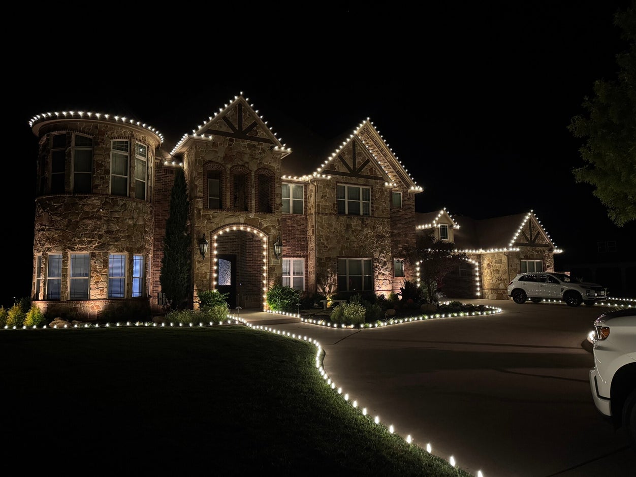 Entryway window and walkway holiday lighting in Fort Worth Texas by TrueLight Property Services