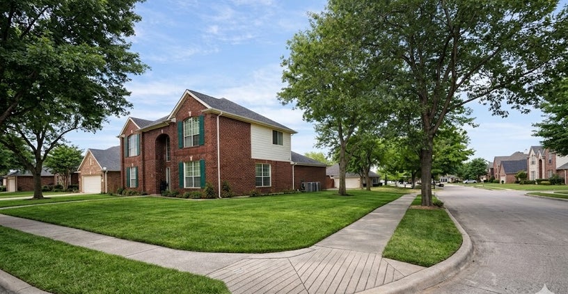 Fresh sod installation preparation in Fort Worth Texas with clean lawn edges surface prep and a professionally finished exterior by TrueLight Property Services