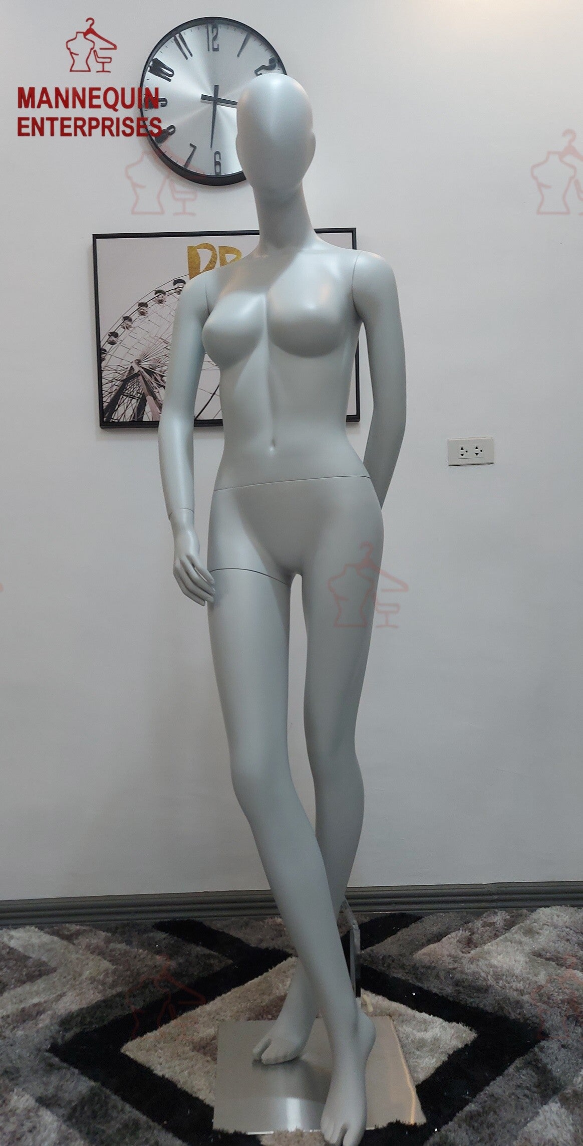 Female Matte Gray Adjustable-Arm Fiberglass Mannequin