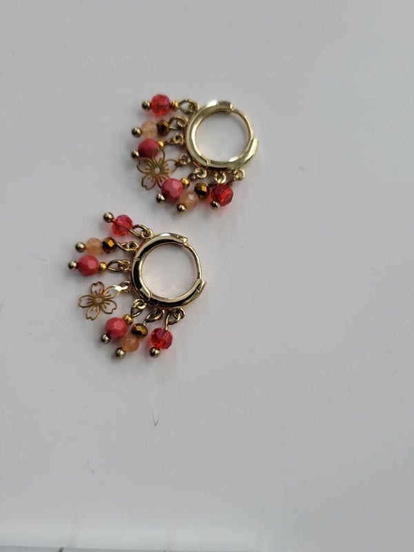 Goud rvs met bedeltjes