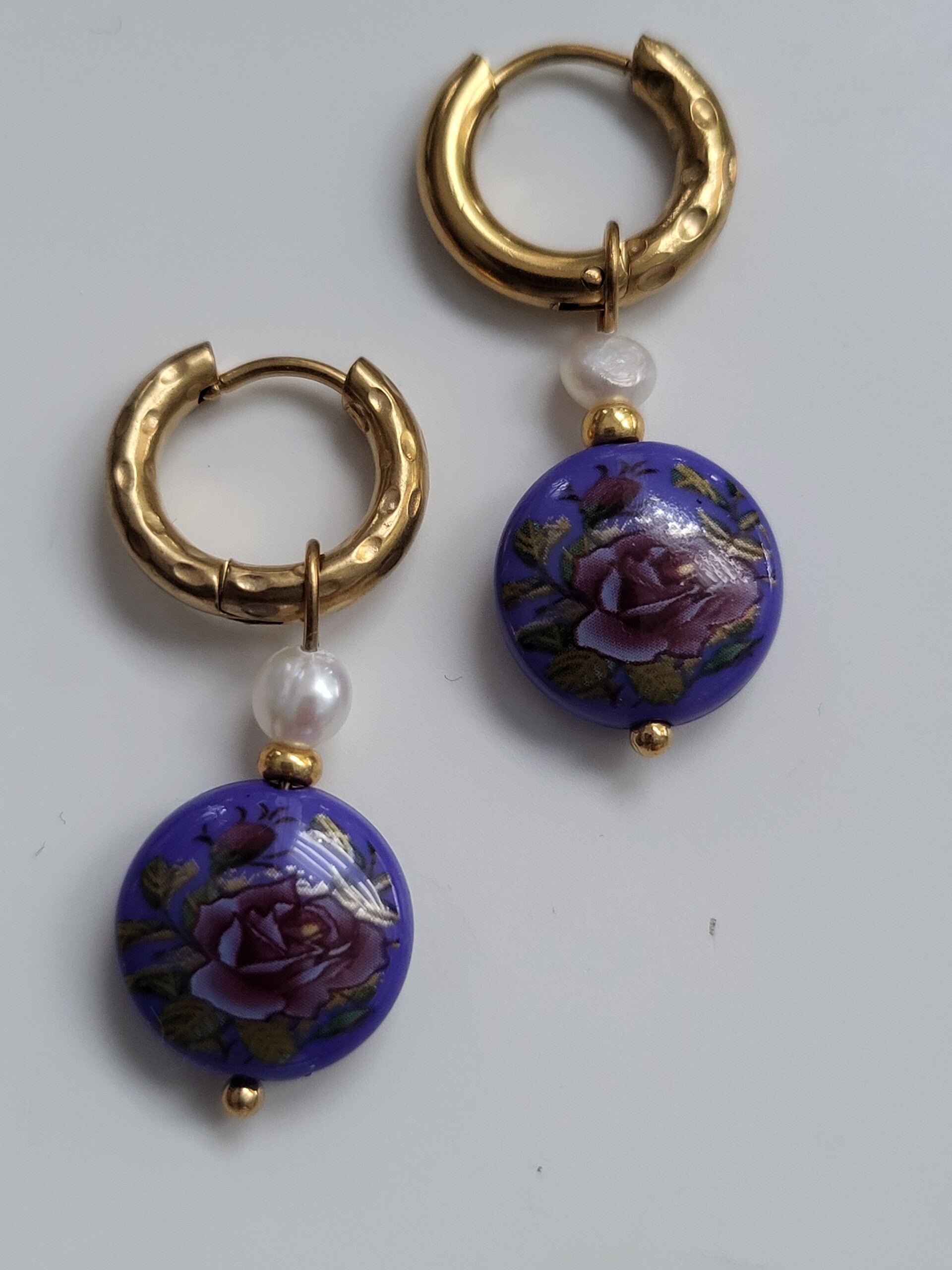 Oorbel rvs haakje Glaskralen 14mm bloem