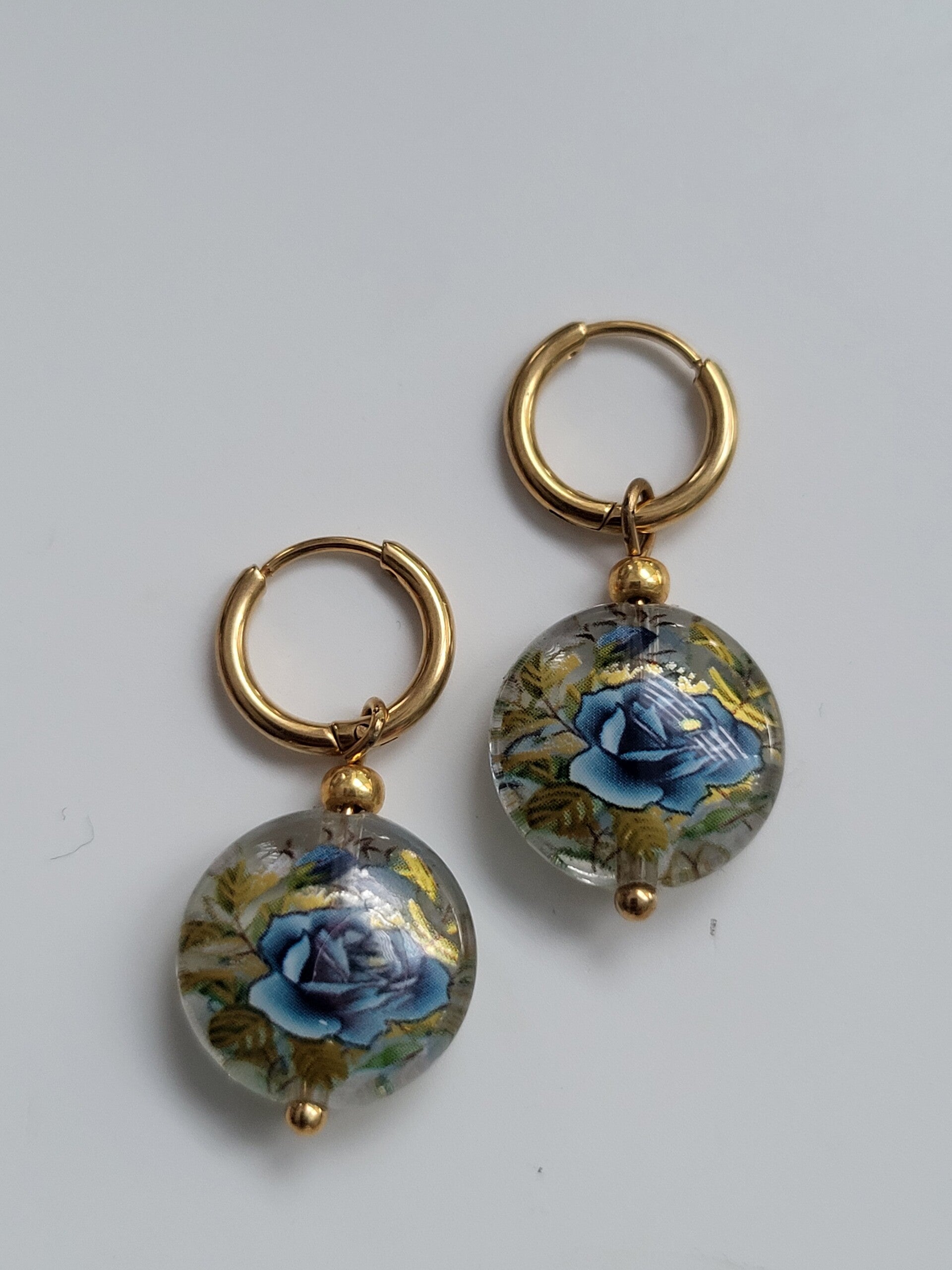 Oorbel rvs haakje Glaskralen 14mm bloem