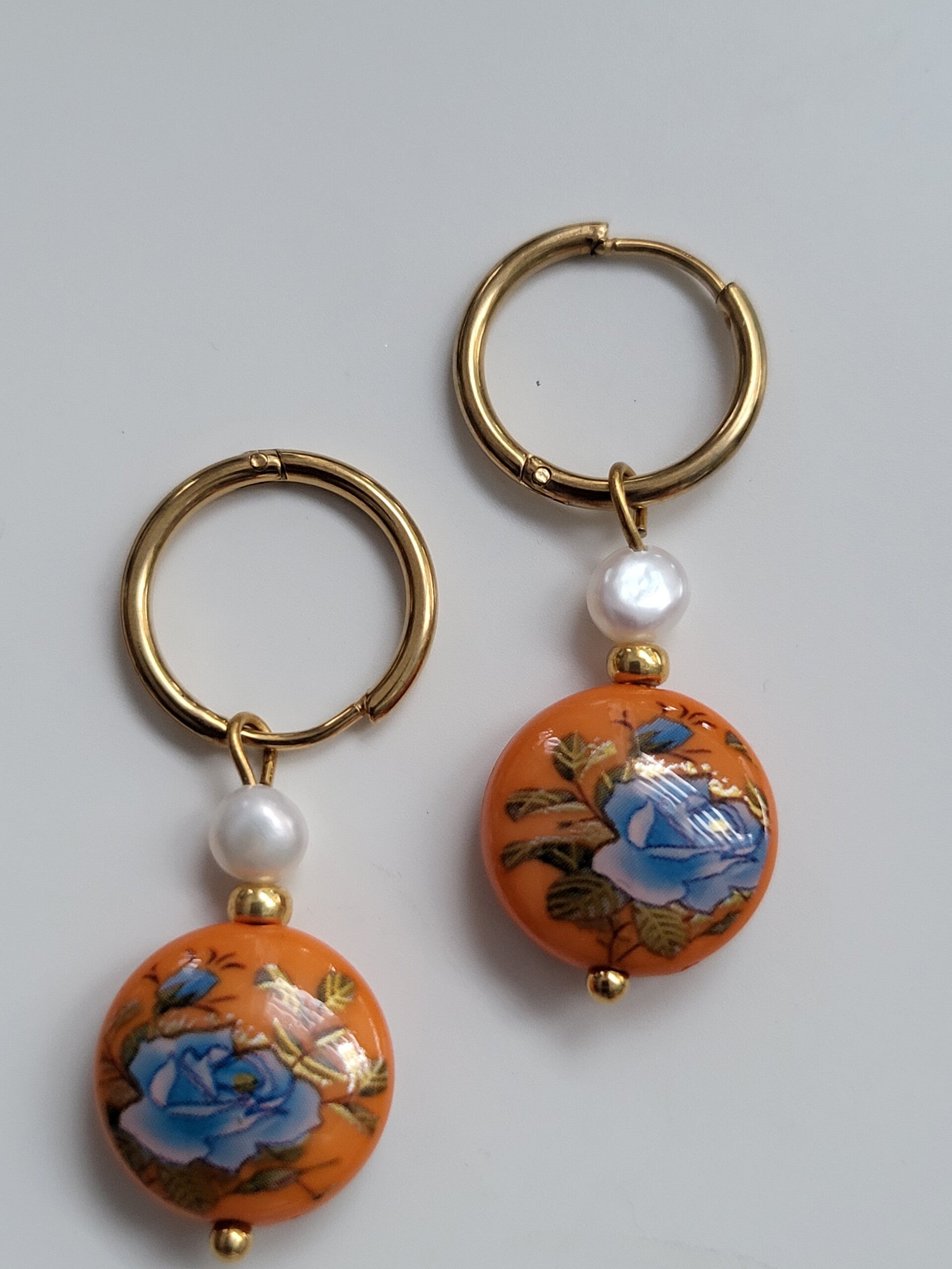 Oorbel rvs haakje Glaskralen 14mm bloem