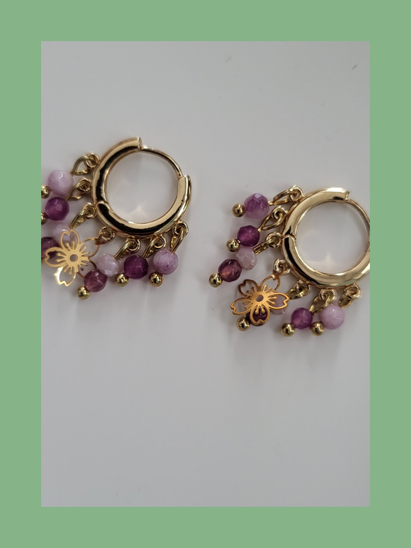 Goud rvs met bedeltjes