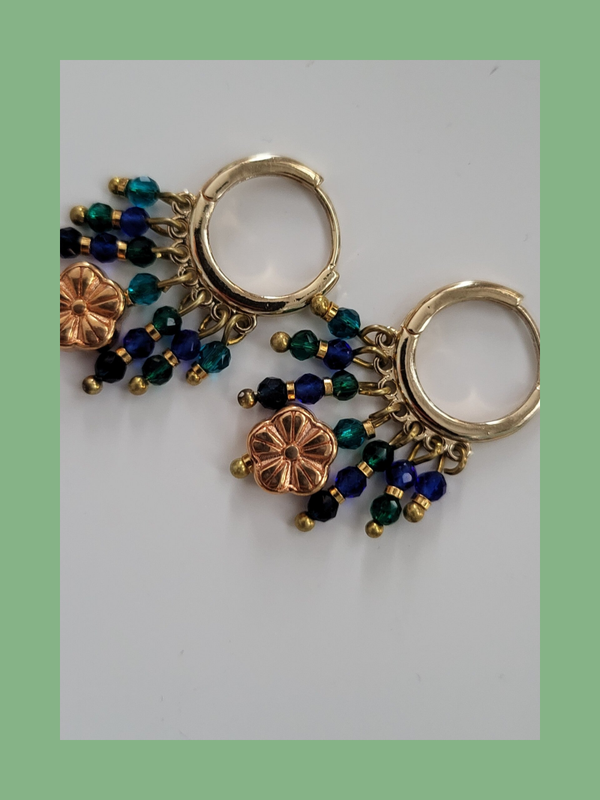 Goud rvs met bedeltjes