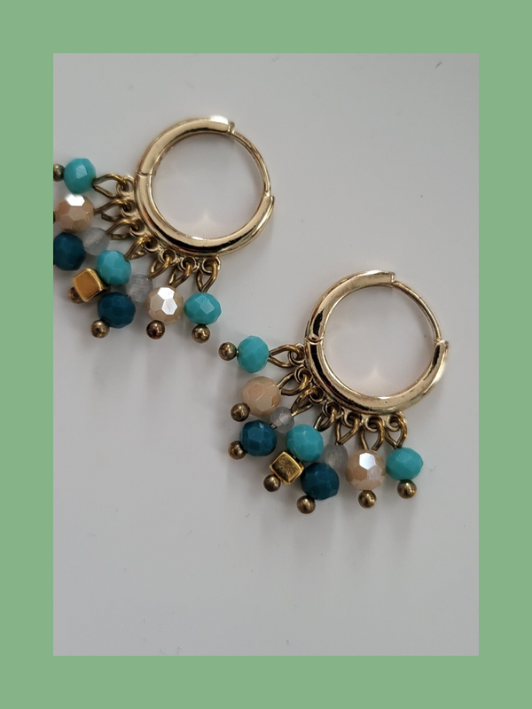 Goud rvs met bedeltjes