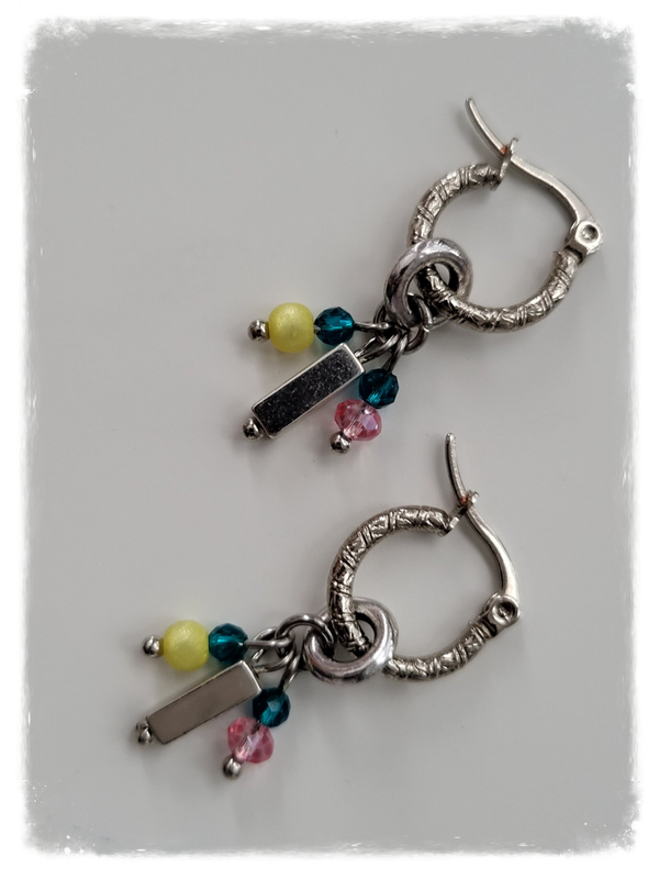 Zilver rvs met bedeltjes