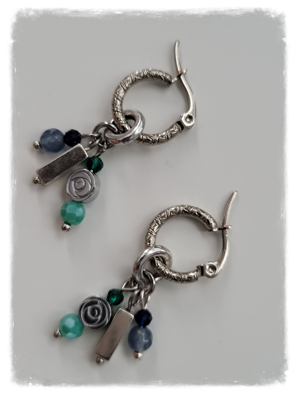 Zilver rvs met bedeltjes