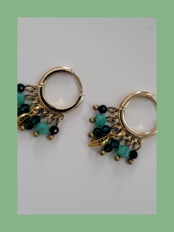 Goud rvs met bedeltjes