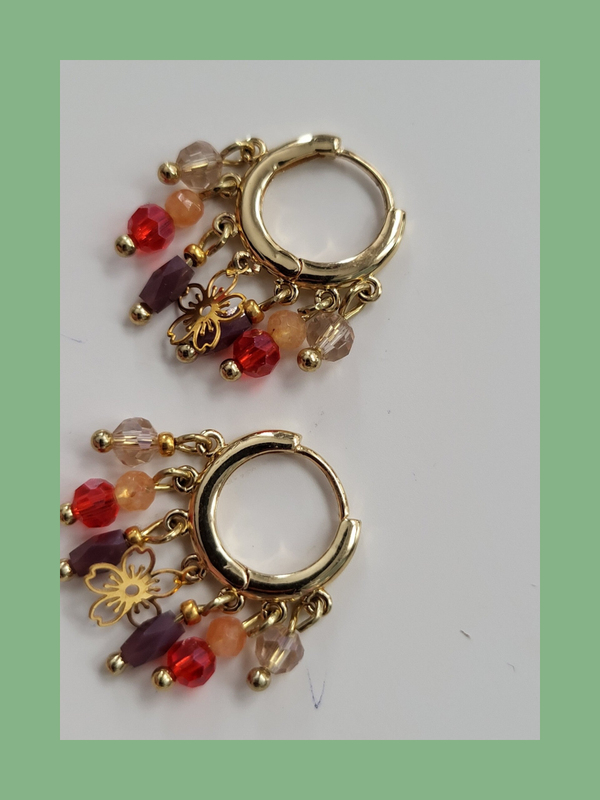 Goud rvs met bedeltjes