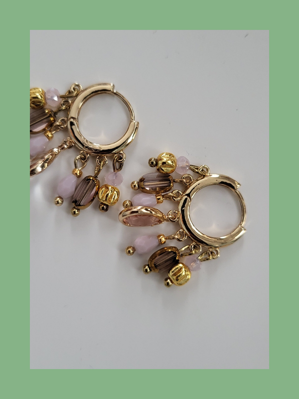 Goud rvs met bedeltjes