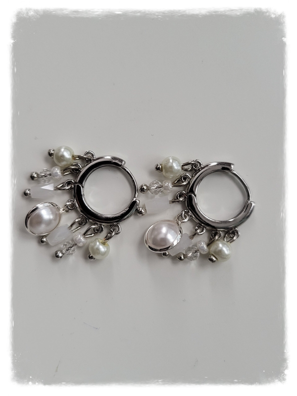Zilver rvs met bedeltjes