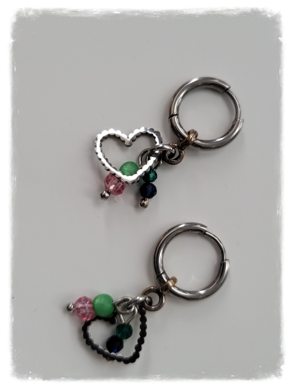 Zilver rvs met bedeltjes