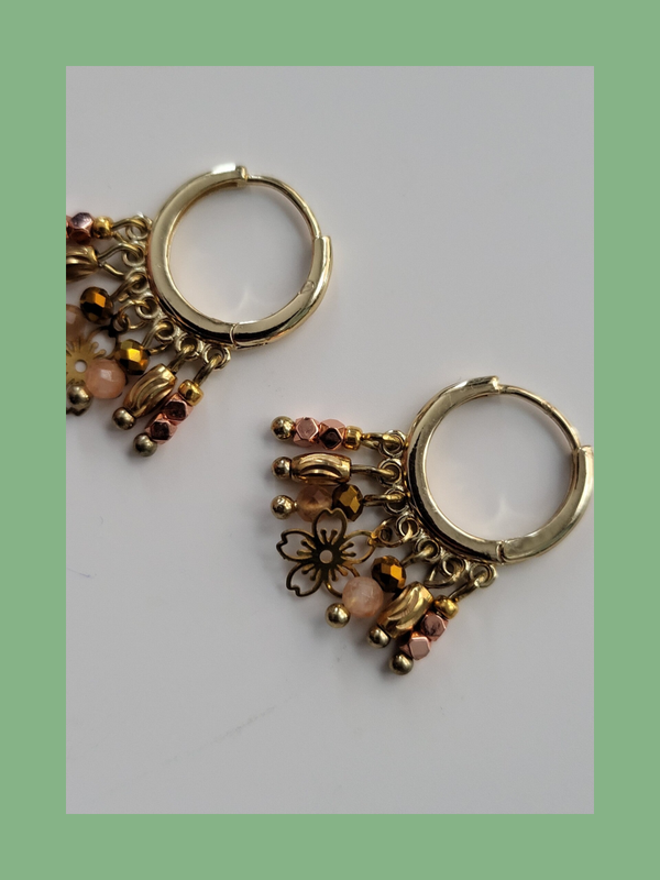 Goud rvs met bedeltjes