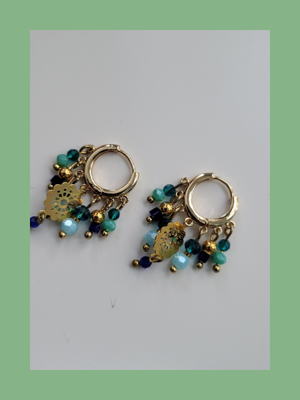 Goud rvs met bedeltjes