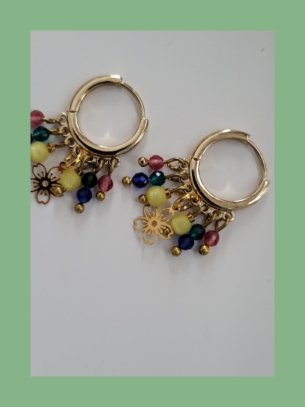 Goud rvs met bedeltjes