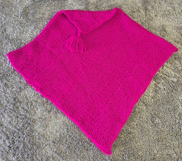 Gestrickter Poncho Gr. 134/140