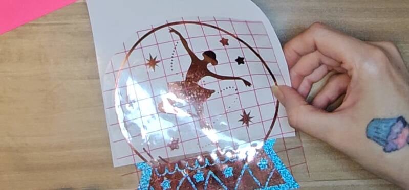 Use adhesive vinyl backing to help align the rose gold vinyl to the front panel.