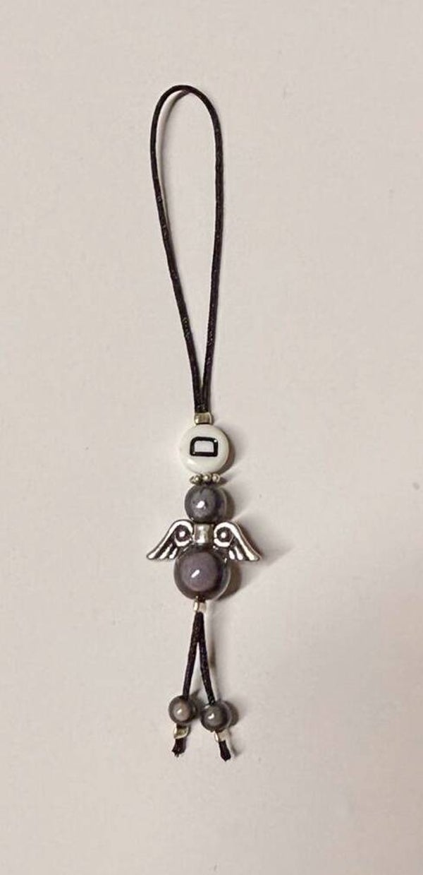 Gigi Angel met initiaal