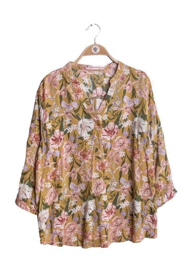 Blouse in mosterd met bloemenprint