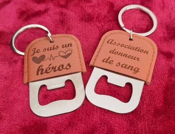 PORTE CLE DECAPSULEUR CUIR/INOX