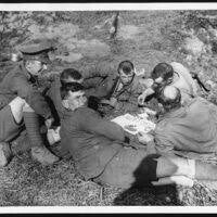 Soldiers of the King’s Own Yorkshire Light Infantry playing cards during a rest period behind the lines in the First World War