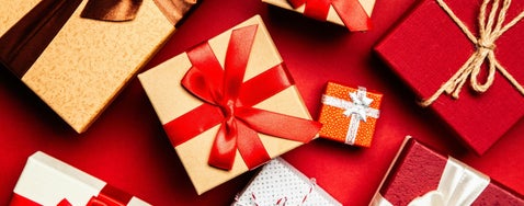 Colourful presents with bows, ideal for illustrating genealogy gift packages focused on WWI and WWII soldier research